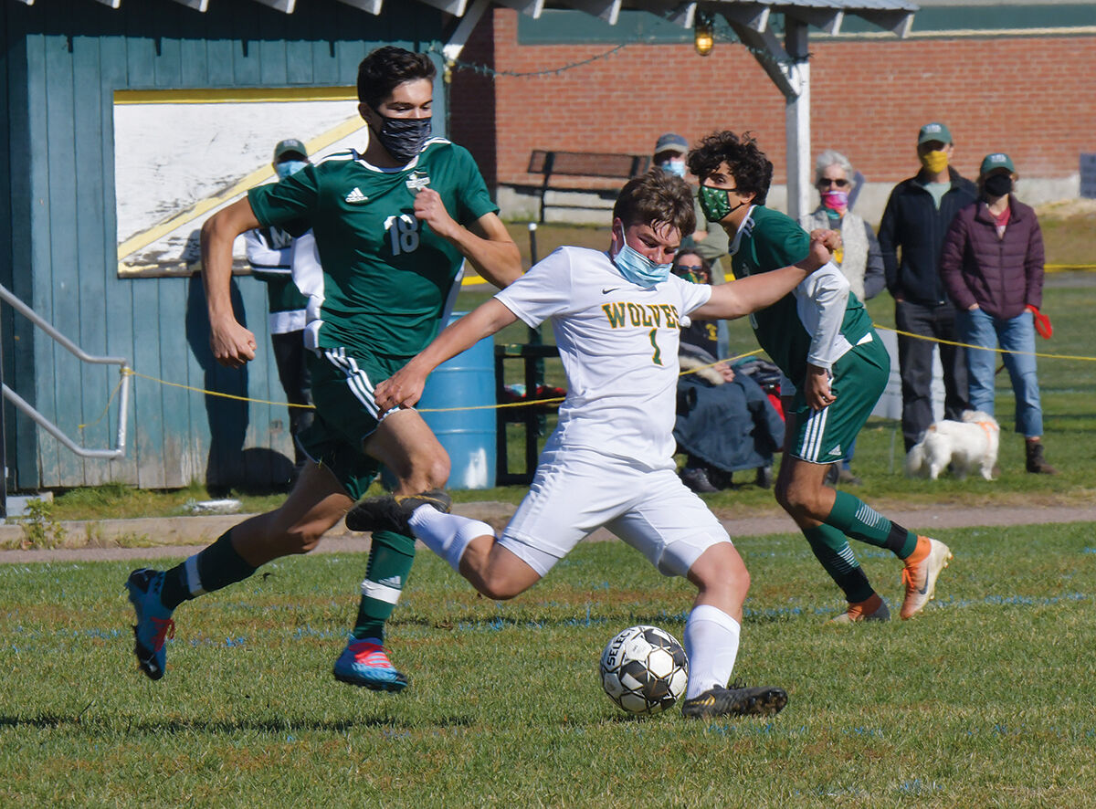 Cole Grant clears the ball